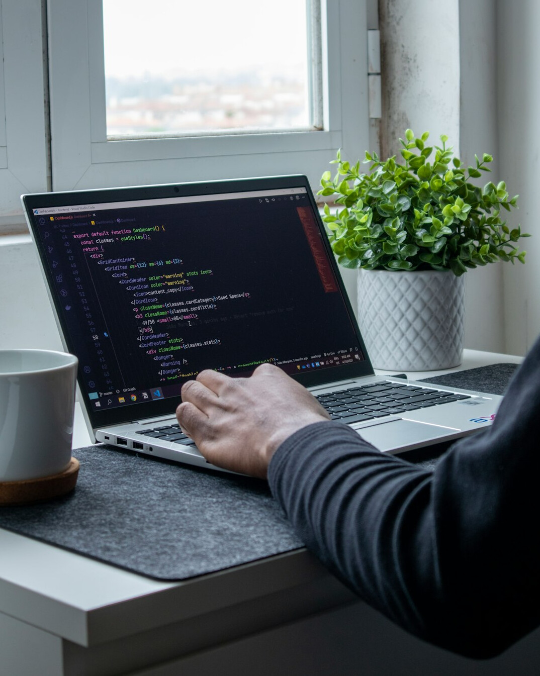 programmer working on insurance software
