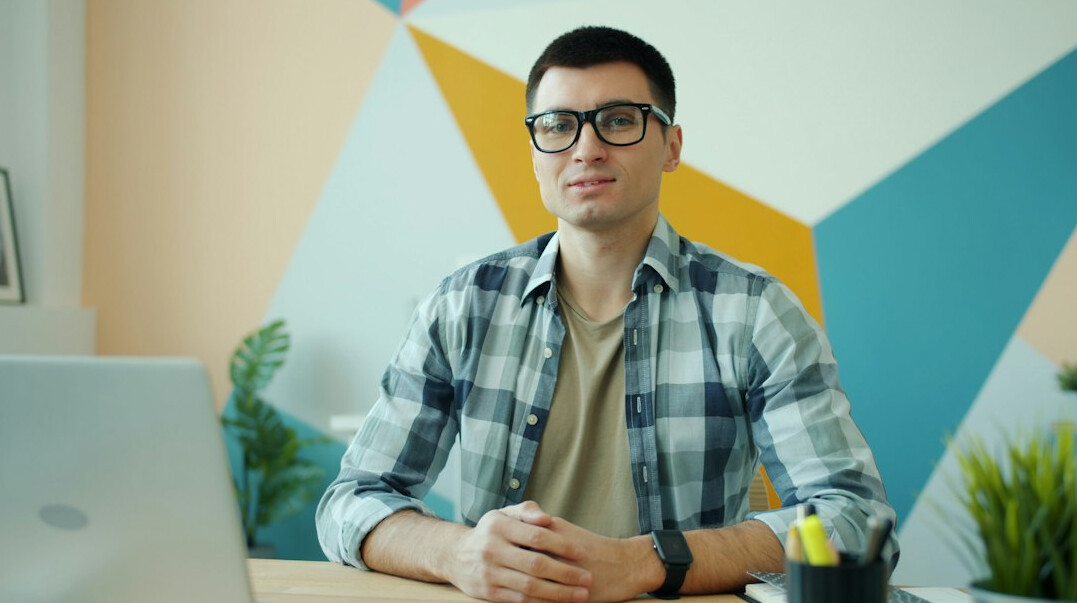insurance software developer at desk